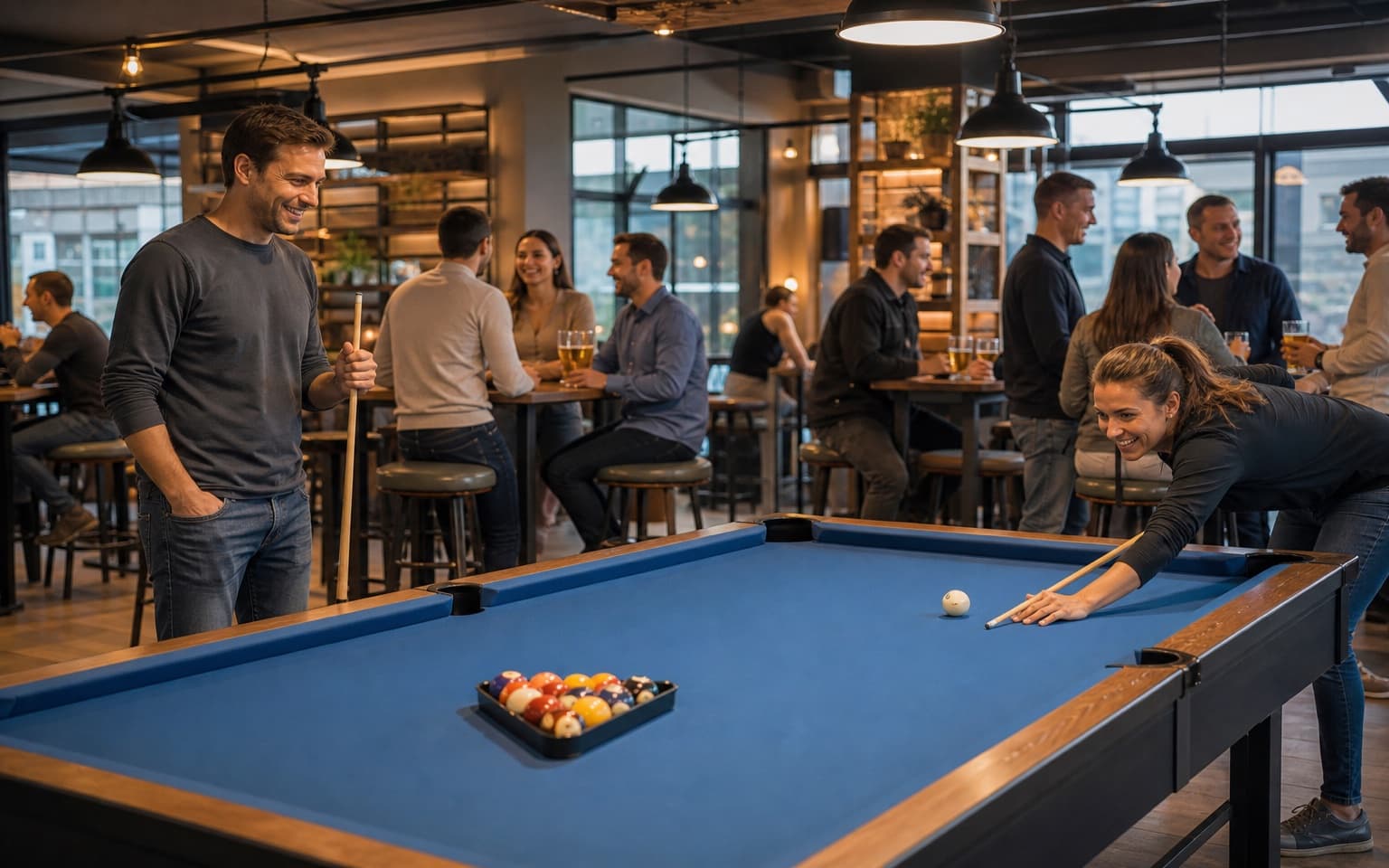 Customers enjoying drinks in a modern American pool hall with bright lighting and professional pool tables